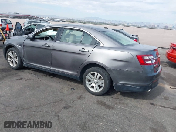 2013 Ford Taurus SEL with VIN 1FAHP2E82DG230831, listed as a IAAI auction lot 42078978 with 207,075 mi miles and . Bid and sale history available at carsss.com. Image 3.