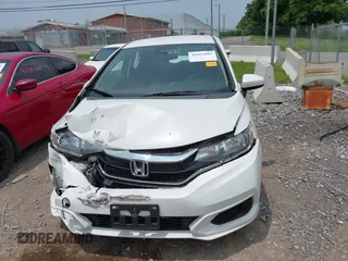 2019 Honda Fit LX with VIN 3HGGK5H41KM728618, listed as a IAAI auction lot 42457662 with 83,851 mi miles and . Bid and sale history available at DreamBid. Image 12.