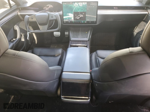 2021 Tesla Model S Plaid with VIN 5YJSA1E63MF451391, listed as a Copart auction lot 54821985 with 50,480 mi miles and Salvage title. Bid and sale history available at DreamBid. Image 8.