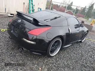 2003 Nissan 350Z Touring with VIN JN1AZ34EX3T013345, listed as a IAAI auction lot 41984329 with 102,115 mi miles. Bid and sale history available at carsss.com. Image 4.