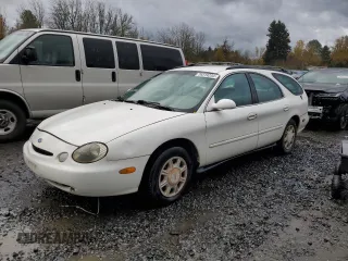 1997 Ford Taurus GL z VIN 1FALP57U2VG108106, wystawiony jako Copart lot #79319234 z przebiegiem 127 098 mil mil oraz Szkoda całkowita • Salvage title. Historia ofert i sprzedaży dostępna na DreamBid. Obrazek 1.