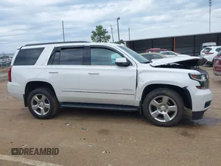 2020 Chevrolet Tahoe LT with VIN 1GNSCBKC4LR181887, listed as a IAAI auction lot 42160821 with 106,757 mi miles and . Bid and sale history available at DreamBid. Image 13.