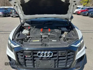 2020 Audi SQ8 z VIN WA1AWAF13LD022753, wystawiony jako Copart lot #58974665 z przebiegiem 84 872 mil mil oraz Tytuł czysty. Historia ofert i sprzedaży dostępna na DreamBid. Obrazek 8.