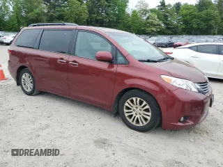 2015 Toyota Sienna XLE with VIN 5TDYK3DC1FS648469, listed as a Copart auction lot 57471975 with 118,567 mi miles and Non repairable. Bid and sale history available at DreamBid. Image 4.