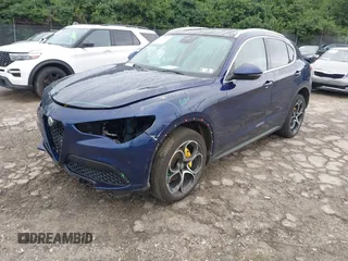 2019 Alfa Romeo Stelvio Ti z VIN ZASPAKBN5K7C58905, wystawiony jako IAAI lot #42431897 z przebiegiem 173 899 mil mil oraz . Historia ofert i sprzedaży dostępna na DreamBid. Obrazek 2.