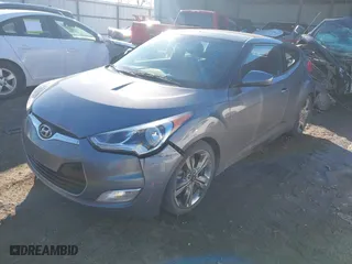 2017 Hyundai Veloster with VIN KMHTC6ADXHU323934, listed as a IAAI auction lot 41335240 with 99,008 mi miles. Bid and sale history available at carsss.com. Image 17.