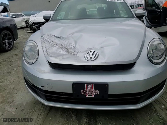 2012 Volkswagen Beetle 2.5L PZEV with VIN 3VWHP7AT5CM618672, listed as a Copart auction lot 46242285 with 148,428 mi miles and Salvage Title. Bid and sale history available at carsss.com. Image 11.
