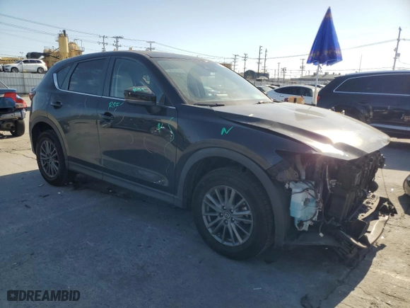 2017 Mazda CX-5 Touring with VIN JM3KFBCL0H0155725, listed as a Copart auction lot 47235715 with 49,840 mi miles and Salvage Title. Bid and sale history available at carsss.com. Image 4.