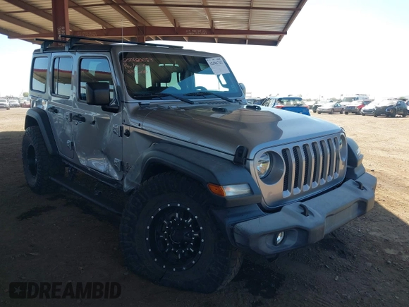 2019 Jeep Wrangler Unlimited Sport S z VIN 1C4HJXDG7KW557682, wystawiony jako IAAI lot #42586742 z przebiegiem 49 741 mil mil oraz . Historia ofert i sprzedaży dostępna na DreamBid. Obrazek 1.