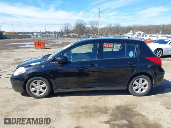 2012 Nissan Versa S with VIN 3N1BC1CP4CK807720, listed as a IAAI auction lot 41779696 with 151,612 mi miles. Bid and sale history available at carsss.com. Image 14.