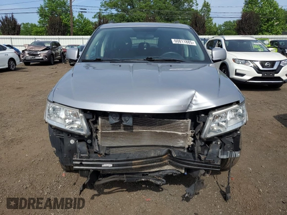 2017 Dodge Journey SXT with VIN 3C4PDDBG4HT608395, listed as a Copart auction lot 60811885 with 145,503 mi miles and Salvage title. Bid and sale history available at DreamBid. Image 5.