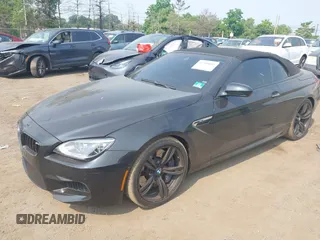 2014 BMW M6 z VIN WBSLZ9C5XEDZ78402, wystawiony jako IAAI lot #42399055 z przebiegiem 127 803 mil mil oraz . Historia ofert i sprzedaży dostępna na DreamBid. Obrazek 2.