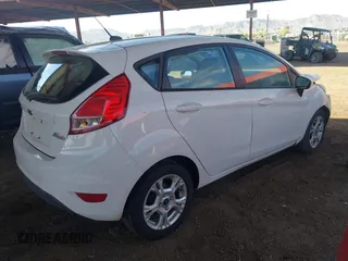2014 Ford Fiesta SE with VIN 3FADP4EJ7EM111919, listed as a IAAI auction lot 42063116 with 154,137 mi miles and . Bid and sale history available at DreamBid. Image 4.