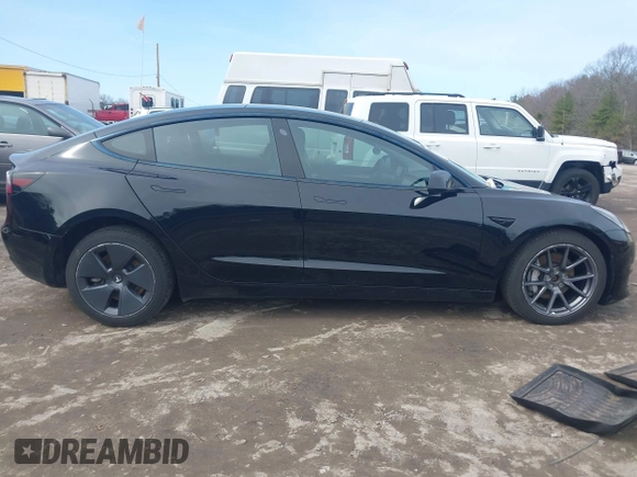2022 Tesla Model 3 Long Range with VIN 5YJ3E1EBXNF177128, listed as a IAAI auction lot 41966089 with 75,140 mi miles and . Bid and sale history available at DreamBid. Image 13.