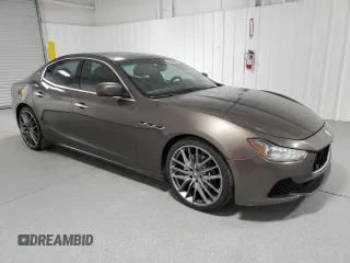 2016 Maserati Ghibli S Q4 z VIN ZAM57RTA4G1168220, wystawiony jako Copart lot #57850955 z przebiegiem 126 378 mil mil oraz Tytuł czysty. Historia ofert i sprzedaży dostępna na DreamBid. Obrazek 4.