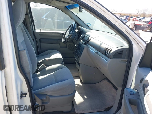 2006 Ford Freestar SE z VIN 2FMDA51656BA22707, wystawiony jako IAAI lot #41754405 z przebiegiem Nie podano mil oraz . Historia ofert i sprzedaży dostępna na DreamBid. Obrazek 5.