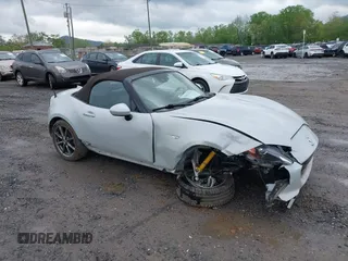 2019 Mazda MX-5 Miata Grand Touring z VIN JM1NDAD77K0304999, wystawiony jako IAAI lot #42105044 z przebiegiem 23 155 mil mil oraz . Historia ofert i sprzedaży dostępna na DreamBid. Obrazek 1.