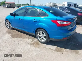 2014 Ford Focus SE with VIN 1FADP3F29EL122925, listed as a IAAI auction lot 42044004 with 216,490 mi miles. Bid and sale history available at carsss.com. Image 3.