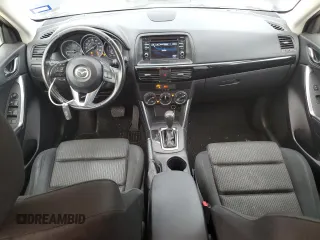 2015 Mazda CX-5 Touring with VIN JM3KE4CYXF0446370, listed as a Copart auction lot 52392575 with 132,419 mi miles and Salvage Title. Bid and sale history available at DreamBid. Image 8.