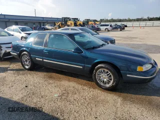 1996 Mercury Cougar z VIN 1MELM62W6TH629420, wystawiony jako Copart lot #67101634 z przebiegiem 71 996 mil mil oraz Szkody całkowita. Historia ofert i sprzedaży dostępna na DreamBid. Obrazek 4.