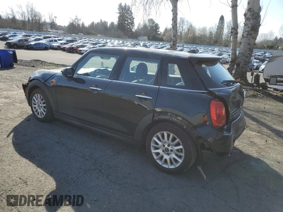 2016 MINI Hardtop 4 Door with VIN WMWXU1C57G2E16741, listed as a Copart auction lot 48392355 with 72,662 mi miles and Salvage Title. Bid and sale history available at DreamBid. Image 2.