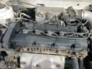 2003 Hyundai Tiburon with VIN KMHHM65D53U042971, listed as a Copart auction lot 86919434 with 202,250 mi miles and Salvage title. Bid and sale history available at DreamBid. Image 13.