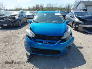 2013 Ford Fiesta SE with VIN 3FADP4EJ9DM158657, listed as a IAAI auction lot 42102761 with 170,845 mi miles and . Bid and sale history available at DreamBid. Image 12.