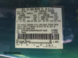 1997 Ford F-150 XL with VIN 1FTDX1860VNA37152, listed as a IAAI auction lot 41713372 with 200,777 mi miles. Bid and sale history available at carsss.com. Image 9.
