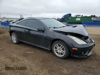 2004 Toyota Celica GT with VIN JTDDR32T540174376, listed as a Copart auction lot 54751115 with 85,335 mi miles and Salvage Title. Bid and sale history available at DreamBid. Image 4.