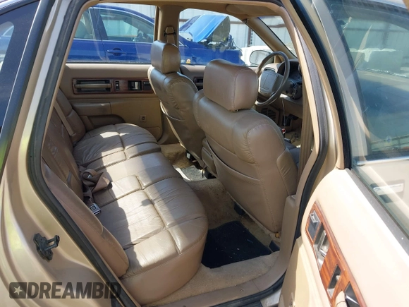 1996 Chevrolet Caprice Classic 1SA Special Value Pkg with VIN 1G1BL52P9TR190980, listed as a IAAI auction lot 42019775 with 135,432 mi miles. Bid and sale history available at carsss.com. Image 8.