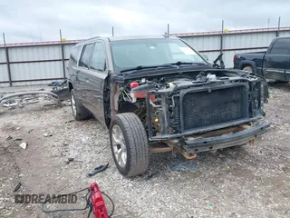 2015 GMC Yukon XL SLT with VIN 1GKS2HKC6FR582574, listed as a IAAI auction lot 41187550 with 185,737 mi miles. Bid and sale history available at carsss.com. Image 1.