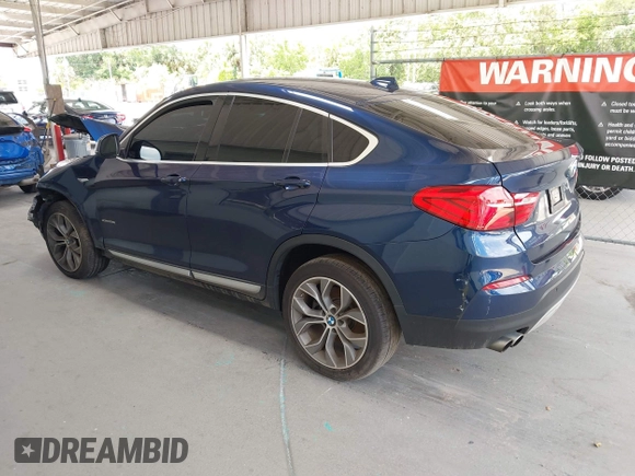 2015 BMW X4 xDrive28i with VIN 5UXXW3C51F0M87268, listed as a IAAI auction lot 42366363 with 143,285 mi miles and . Bid and sale history available at DreamBid. Image 3.