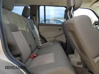 2010 Jeep Liberty Sport with VIN 1J4PP2GK4AW102018, listed as a Copart auction lot 50337815 with 117,385 mi miles and Salvage Title. Bid and sale history available at DreamBid. Image 11.