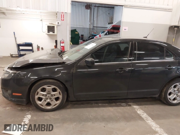 2011 Ford Fusion SE with VIN 3FAHP0HA9BR128452, listed as a IAAI auction lot 41798473 with 136,844 mi miles. Bid and sale history available at carsss.com. Image 14.