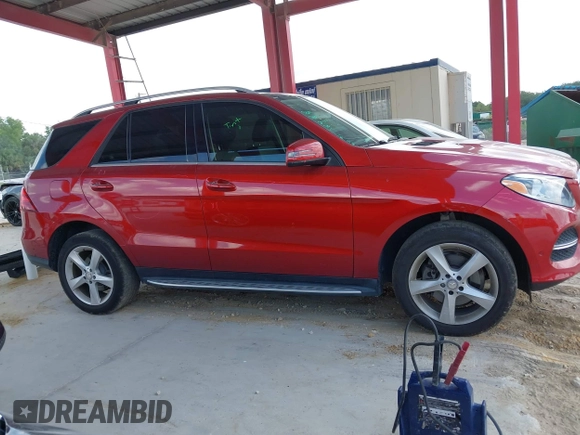 2016 Mercedes-Benz GLE 350 with VIN 4JGDA5JB7GA653209, listed as a IAAI auction lot 42323573 with 66,532 mi miles and . Bid and sale history available at DreamBid. Image 14.