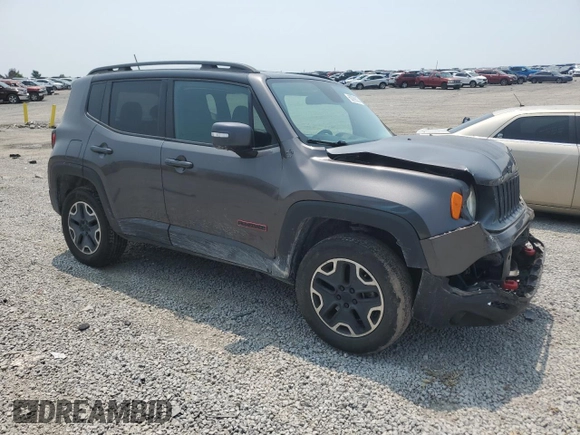 2016 Jeep Renegade Trailhawk with VIN ZACCJBCT5GPC75735, listed as a Copart auction lot 60299005 with 121,990 mi miles and Salvage title. Bid and sale history available at DreamBid. Image 4.