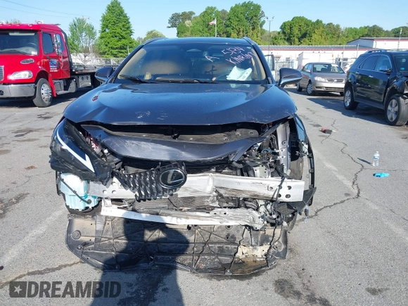 2023 Lexus NX with VIN 2T2GKCEZXPC015134, listed as a IAAI auction lot 41984994 with 19,264 mi miles. Bid and sale history available at carsss.com. Image 12.