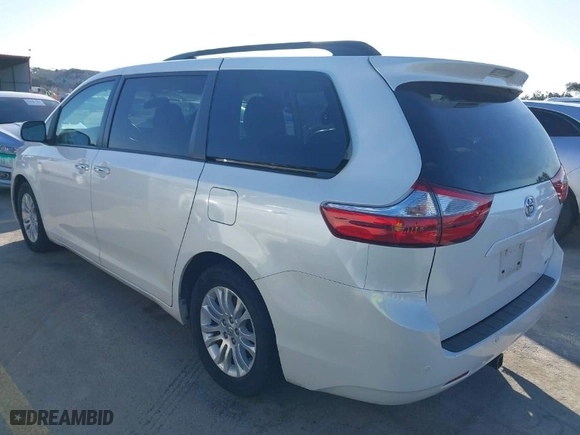 2016 Toyota Sienna XLE with VIN 5TDYK3DC6GS758189, listed as a IAAI auction lot 41598251 with 129,050 mi miles. Bid and sale history available at carsss.com. Image 3.