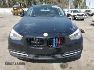 2014 BMW 5 Series GT 550i xDrive with VIN WBA5M0C5XED084908, listed as a Copart auction lot 50619945 with 97,680 mi miles and Salvage Title. Bid and sale history available at carsss.com. Image 5.