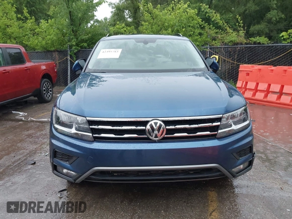 2018 Volkswagen Tiguan SEL with VIN 3VV2B7AX4JM019965, listed as a IAAI auction lot 42395783 with 107,822 mi miles and . Bid and sale history available at DreamBid. Image 12.