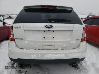 2011 Ford Edge SEL with VIN 2FMDK3JC4BBB06227, listed as a Copart auction lot 37962614 with 128,574 mi miles and Salvage Title. Bid and sale history available at carsss.com. Image 6.