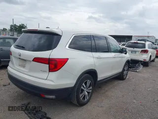 2018 Honda Pilot EX-L with VIN 5FNYF5H55JB016471, listed as a IAAI auction lot 42397519 with 102,482 mi miles and . Bid and sale history available at DreamBid. Image 4.