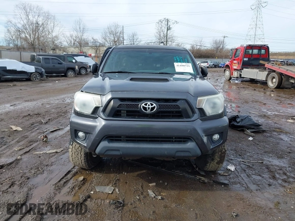 2014 Toyota Tacoma with VIN 3TMLU4EN0EM148389, listed as a IAAI auction lot 41490721 with 119,731 mi miles. Bid and sale history available at carsss.com. Image 12.