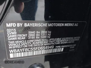 2015 BMW 7 Series 750Li xDrive with VIN WBAYF8C55FD654949, listed as a IAAI auction lot 41659763 with 91,837 mi miles and . Bid and sale history available at carsss.com. Image 9.