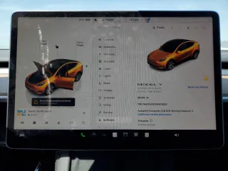 2022 Tesla Model Y Long Range z VIN 7SAYGDEE2NF513823, wystawiony jako Copart lot #51174795 z przebiegiem 28 143 mil mil oraz Szkody całkowita. Historia ofert i sprzedaży dostępna na DreamBid. Obrazek 9.