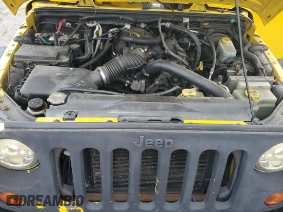 2009 Jeep Wrangler X с VIN 1J4FA24169L731334, выставлен на аукционе Copart как лот 61604715 с пробегом 207 807 миль миль и Чистый • Clean title. История ставок и продаж доступна на DreamBid. Изображение 11.