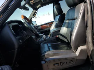 2015 Lincoln Navigator z VIN 5LMJJ2JT7FEJ04172, wystawiony jako Copart lot #51412255 z przebiegiem 220 416 mil mil oraz Szkoda całkowita • Salvage title. Historia ofert i sprzedaży dostępna na DreamBid. Obrazek 7.