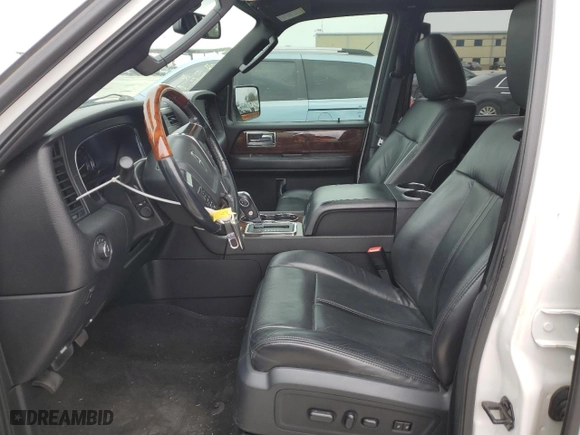 2015 Lincoln Navigator with VIN 5LMJJ2JTXFEJ11990, listed as a Copart auction lot 89216035 with 148,269 mi miles and Salvage Title. Bid and sale history available at carsss.com. Image 7.