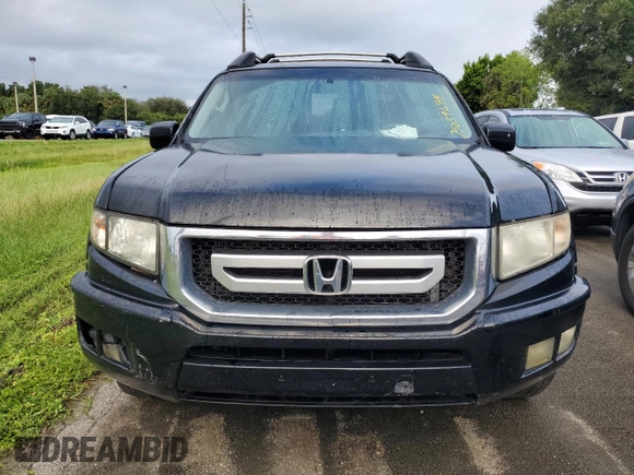 2010 Honda Ridgeline RTL with VIN 5FPYK1F5XAB010390, listed as a Copart auction lot 75039634 with 0 mi miles and Salvage Title. Bid and sale history available at carsss.com. Image 5.