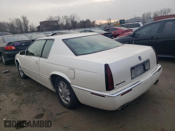 1999 Cadillac Eldorado z VIN 1G6EL12Y5XU600699, wystawiony jako Copart lot #88164505 z przebiegiem 140 075 mil mil oraz Szkoda całkowita • Salvage title. Historia ofert i sprzedaży dostępna na DreamBid. Obrazek 2.
